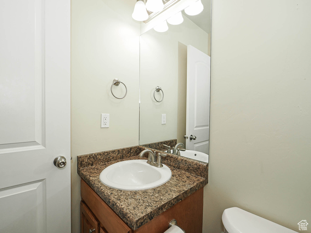 Bathroom with vanity and toilet