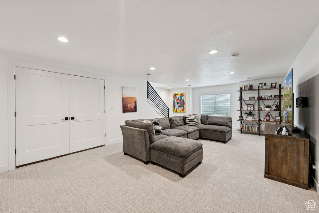 Living room featuring carpet floors and recessed lighting