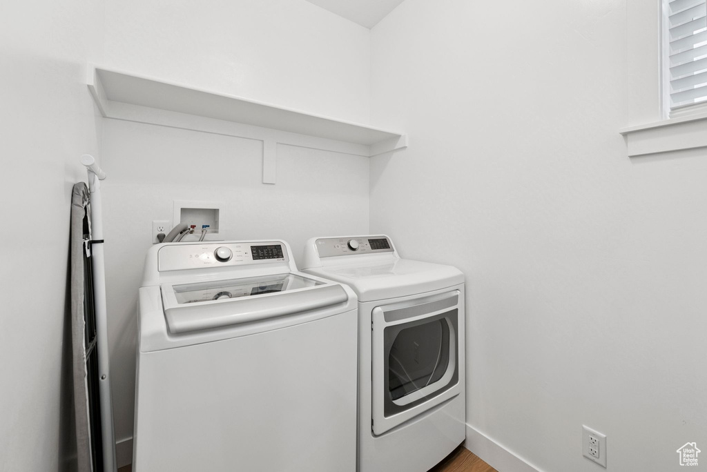 Laundry room with washing machine and dryer