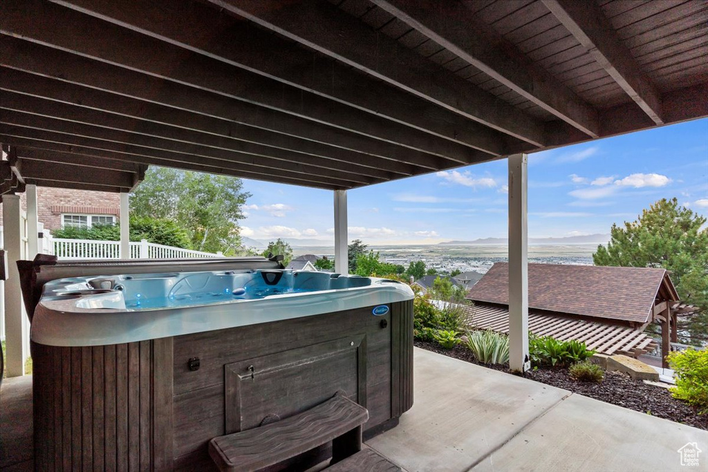 View of patio / terrace featuring a hot tub