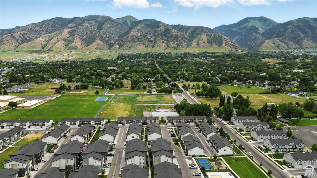 View of mountain background featuring nearby suburban area