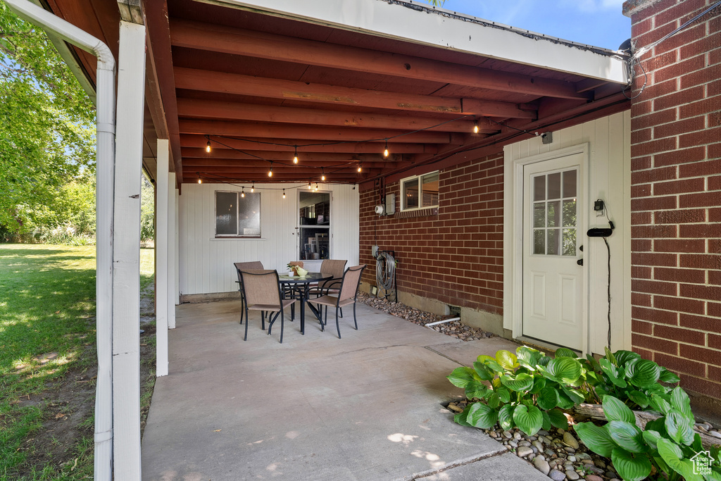 View of patio with outdoor dining space