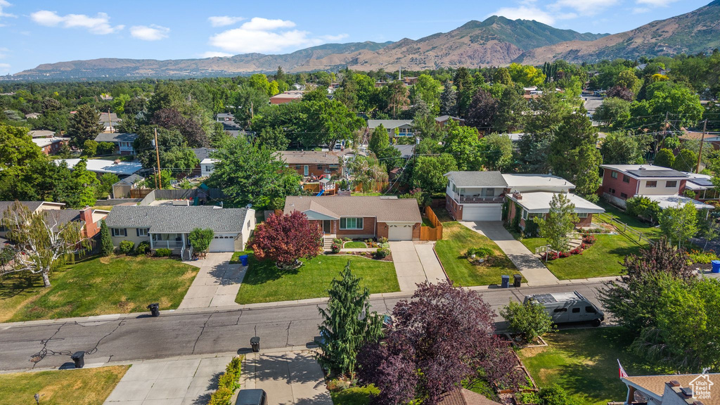 Aerial perspective of suburban area featuring mountains