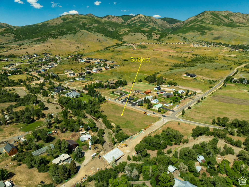 Aerial overview of property\'s location featuring mountains