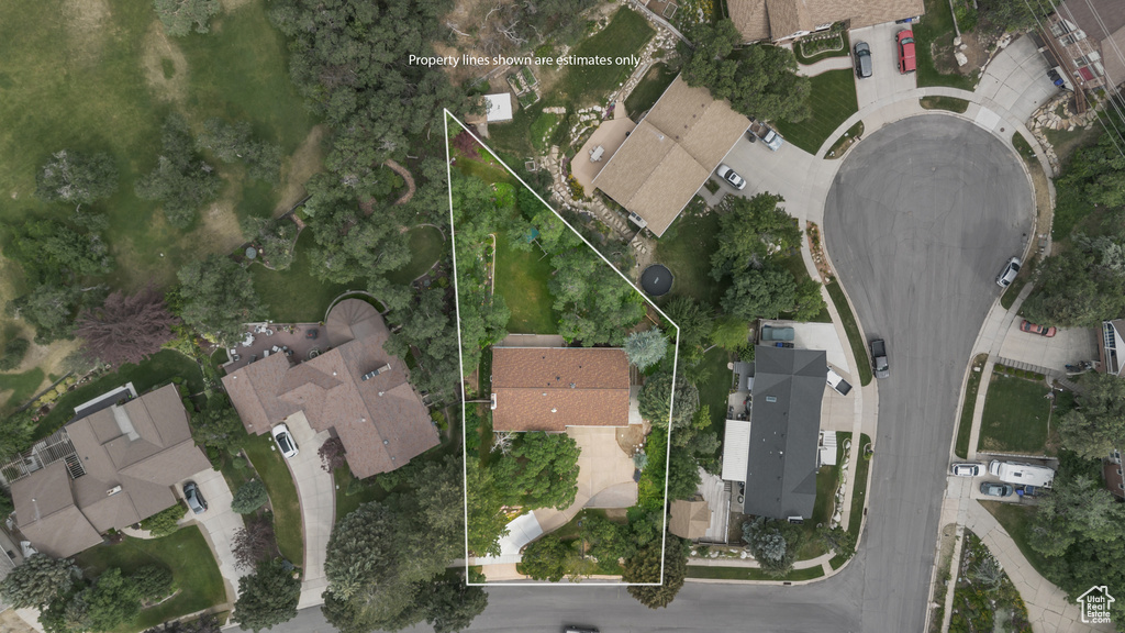 Aerial perspective of suburban area with property parcel outlined