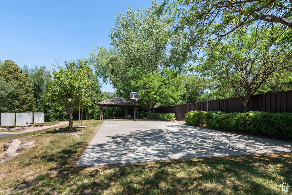 View of yard featuring a gazebo, mail area, and community basketball court