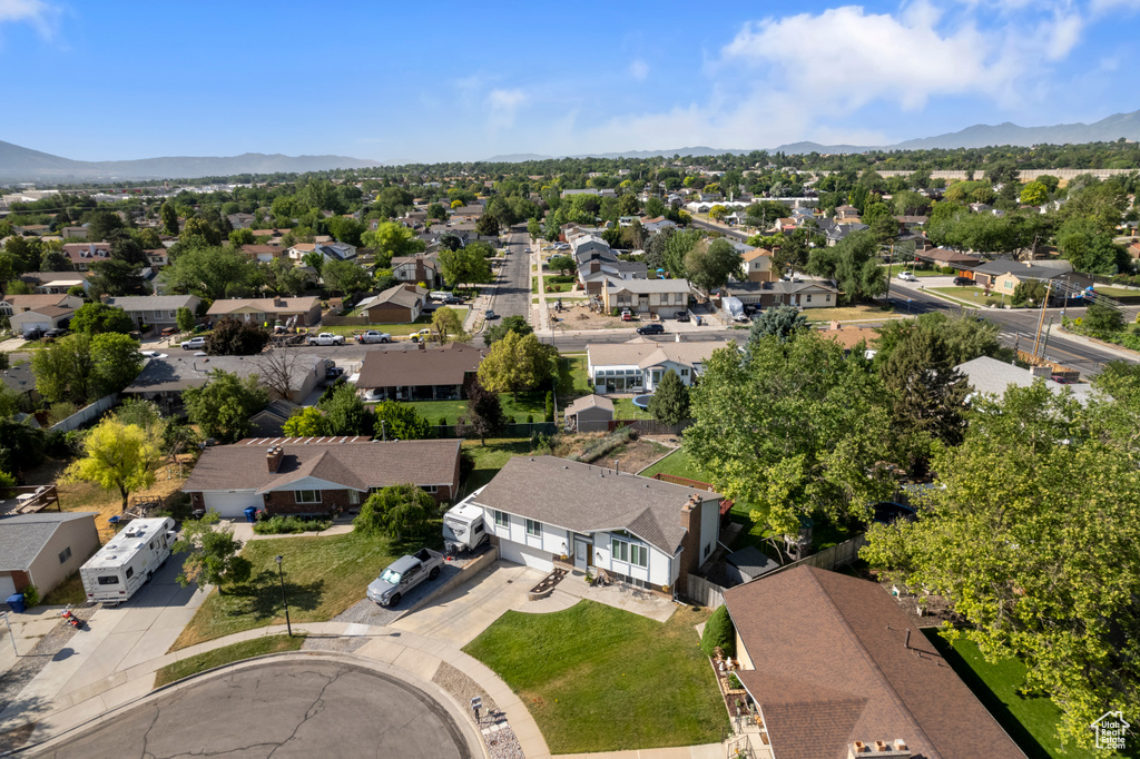 Aerial view of residential area with a mountainous background