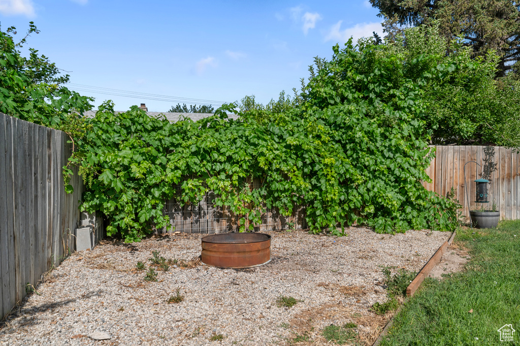 View of fenced backyard