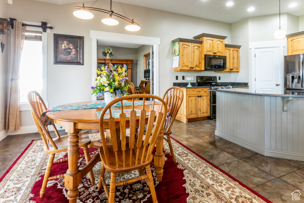 Dining area featuring recessed lighting and baseboards