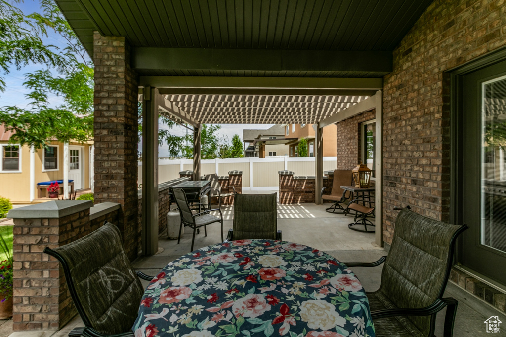 View of patio with outdoor dining space
