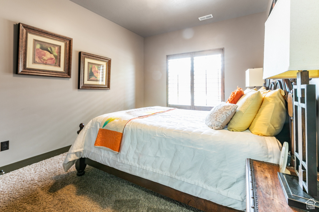 Bedroom with carpet floors