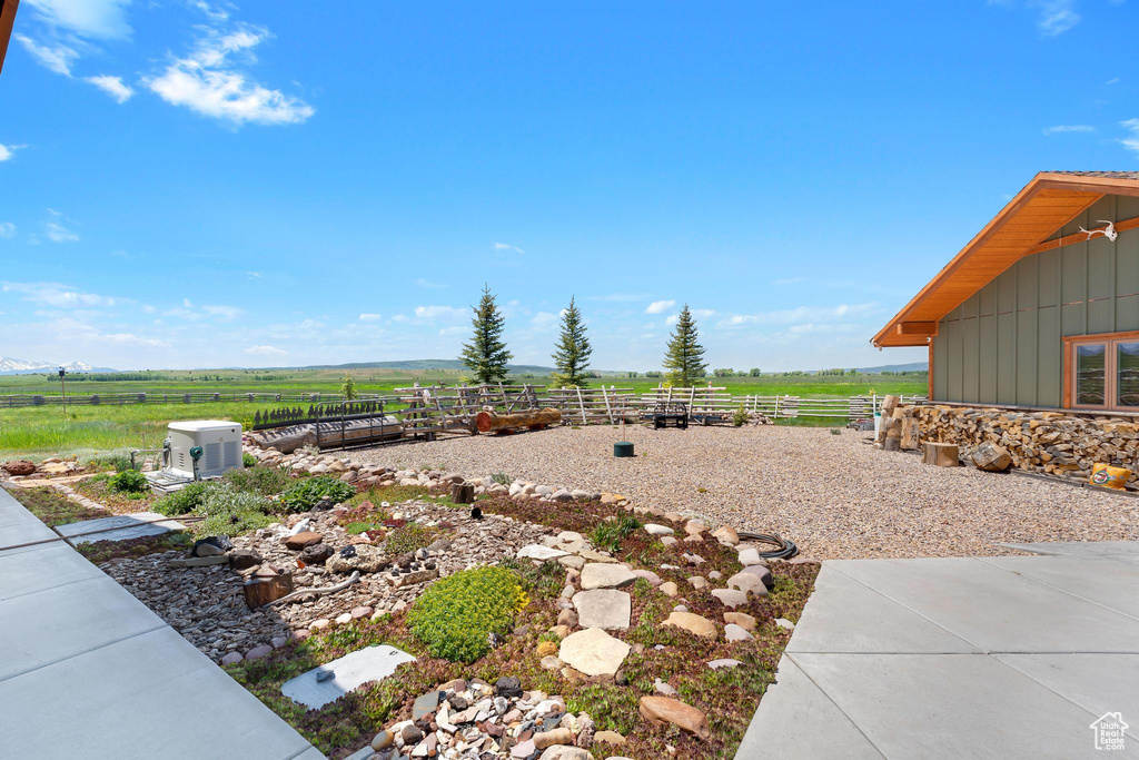 View of yard featuring a view of rural / pastoral area