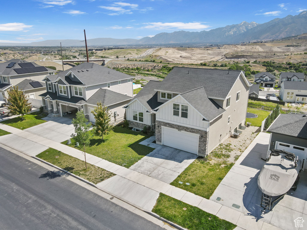 Aerial perspective of suburban area with mountains