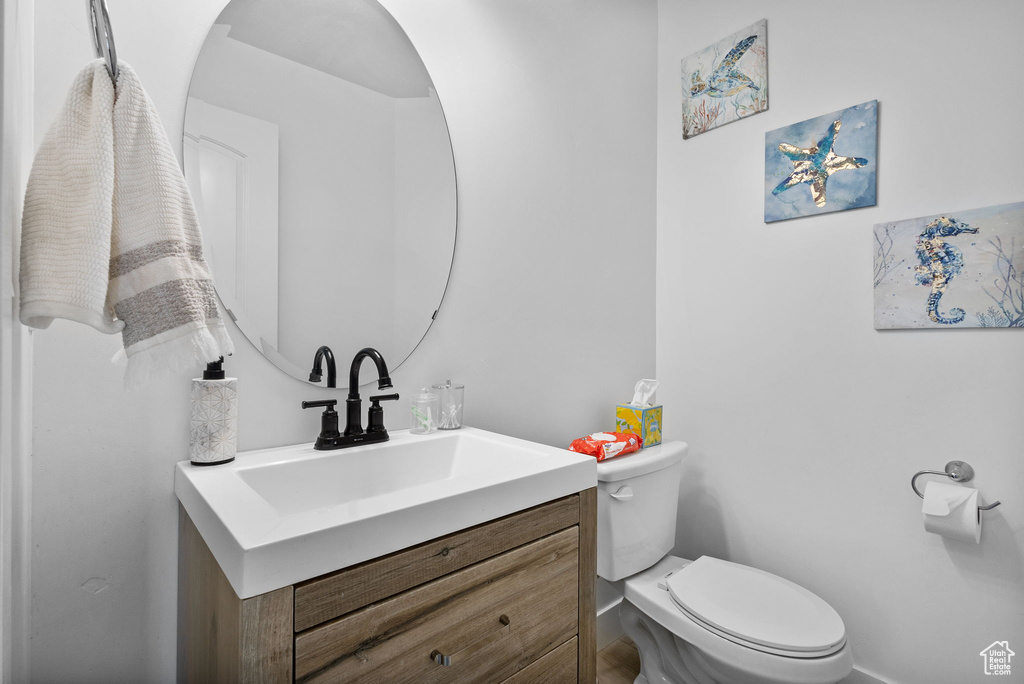 Bathroom with vanity and toilet