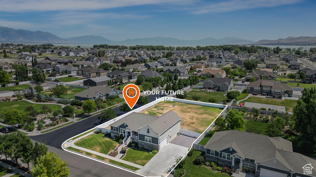 Aerial perspective of suburban area with mountains