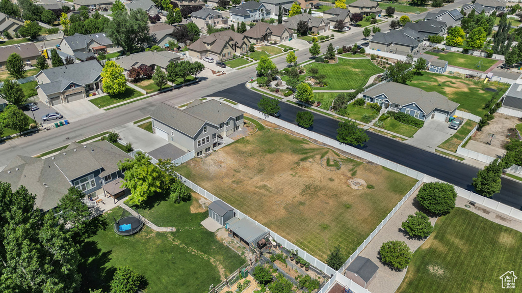 Aerial overview of property\'s location featuring nearby suburban area