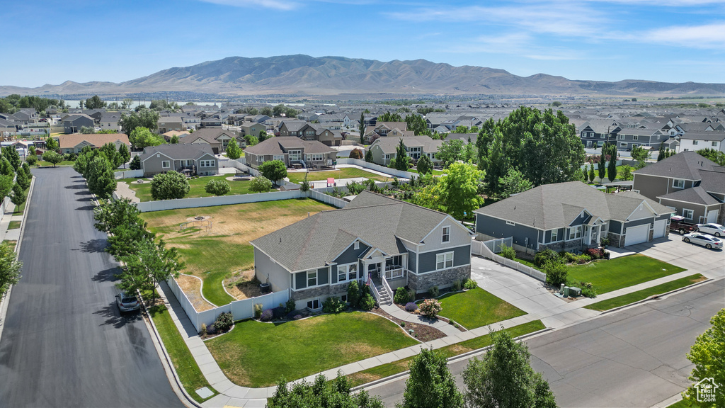 Aerial view of residential area with a mountain backdrop