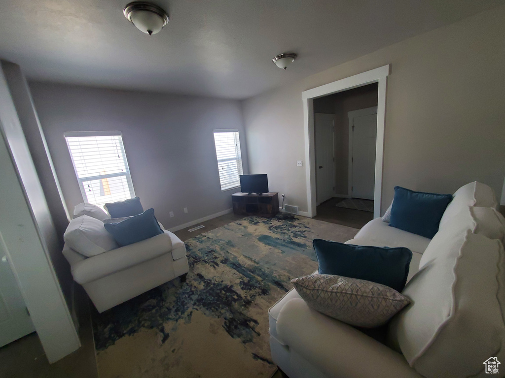 Living area featuring baseboards