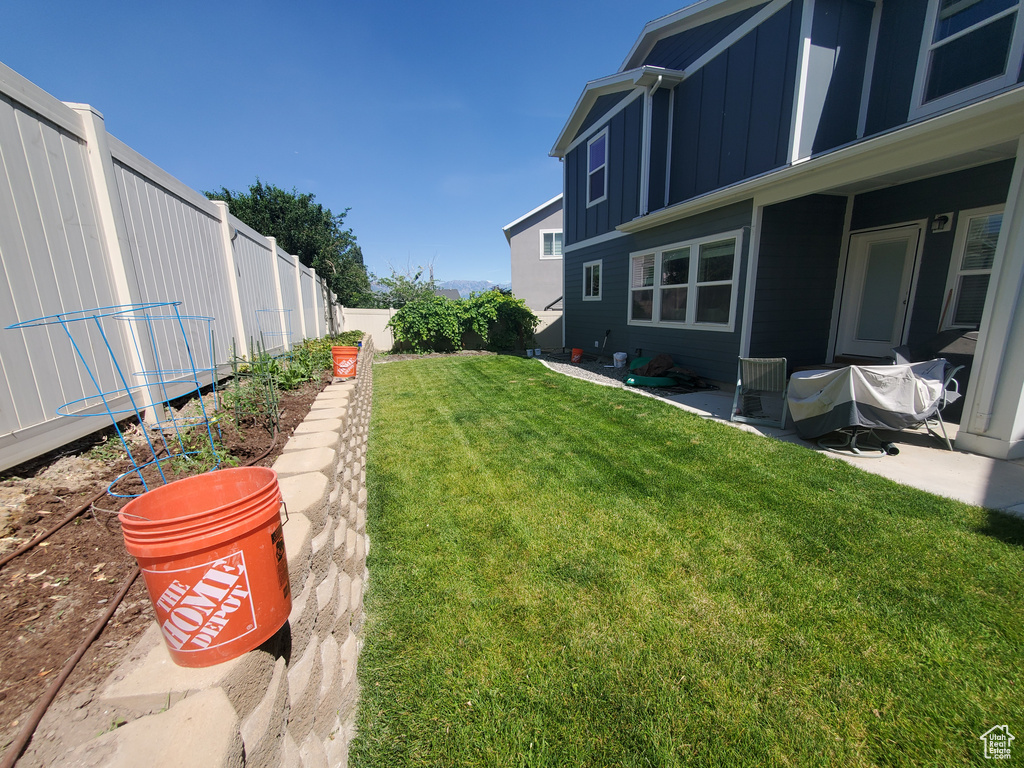 View of fenced backyard