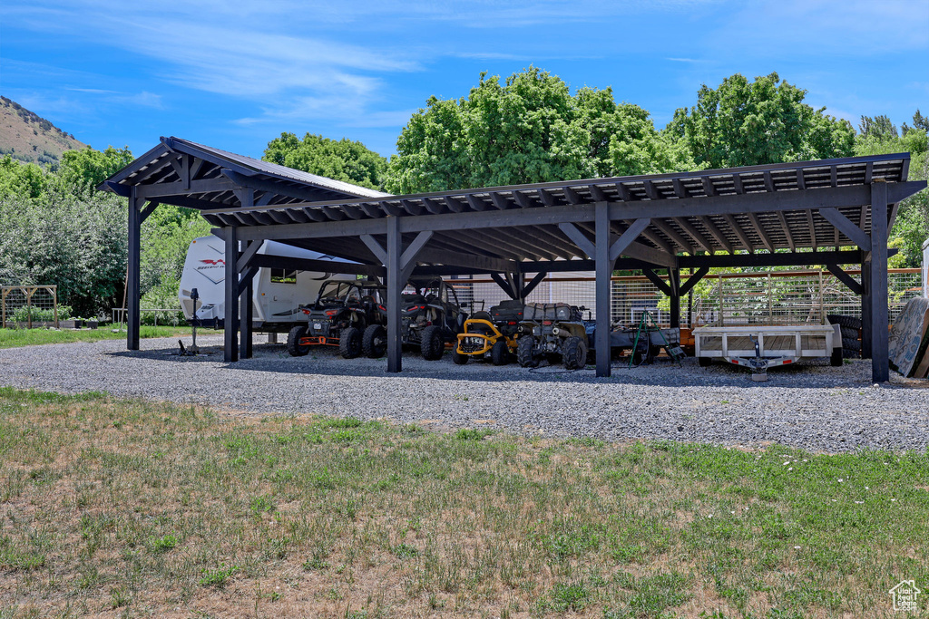 View of home\\\\\\\'s community featuring a carport