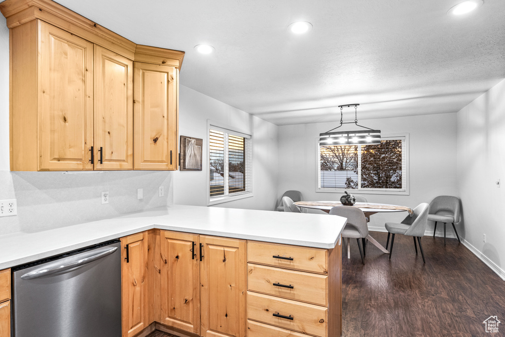 Kitchen featuring dishwasher, light brown cabinetry, a peninsula, light countertops, and recessed lighting