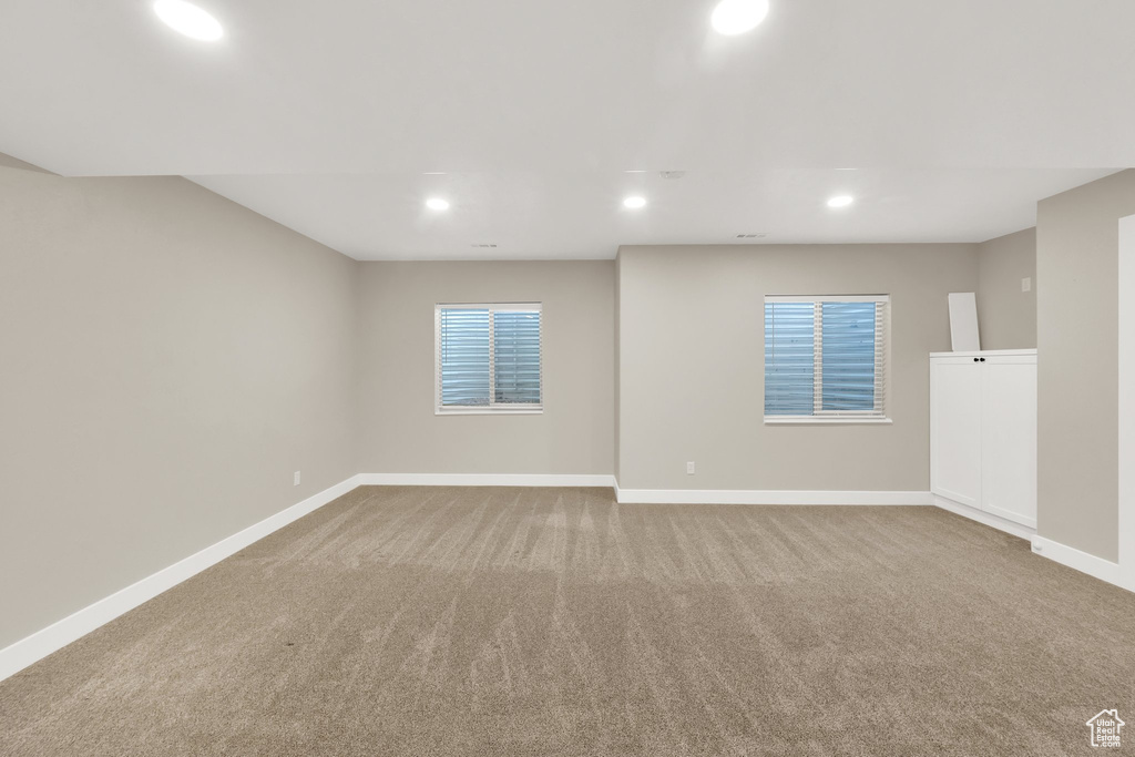 Unfurnished room with carpet flooring and recessed lighting