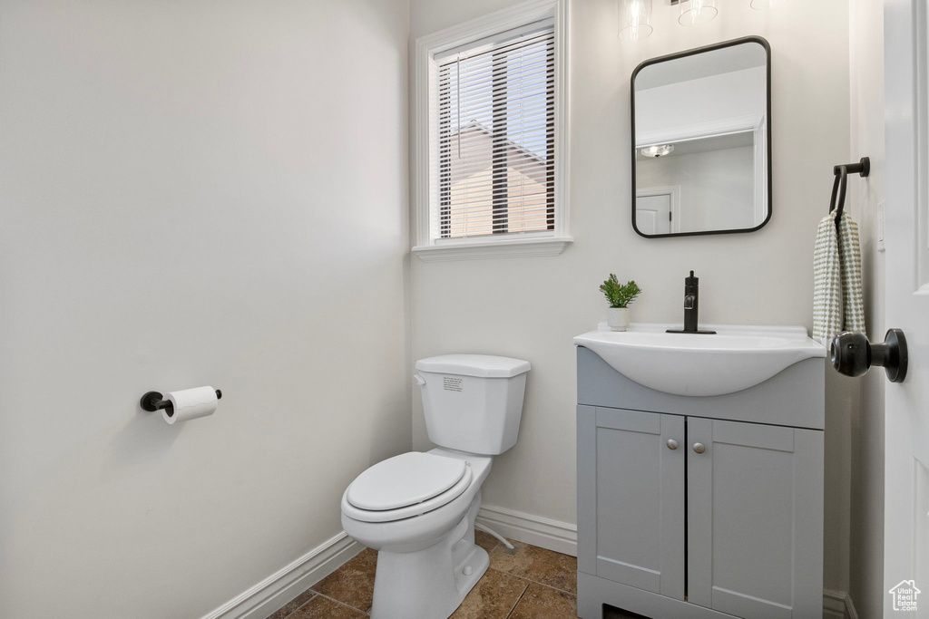 Bathroom featuring toilet and vanity
