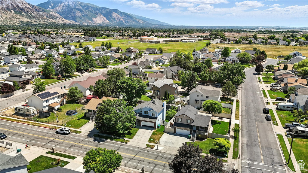 Aerial view of residential area with mountains