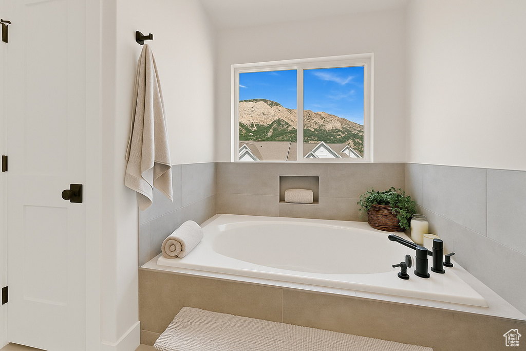 Full bathroom with a garden tub