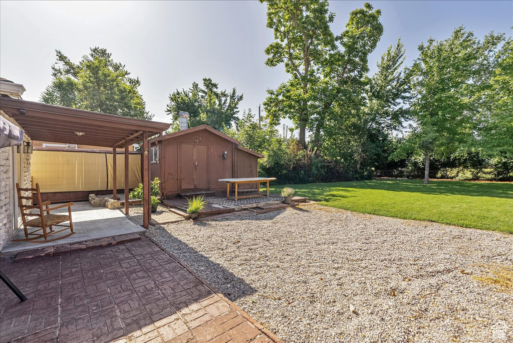 View of patio / terrace with a storage unit