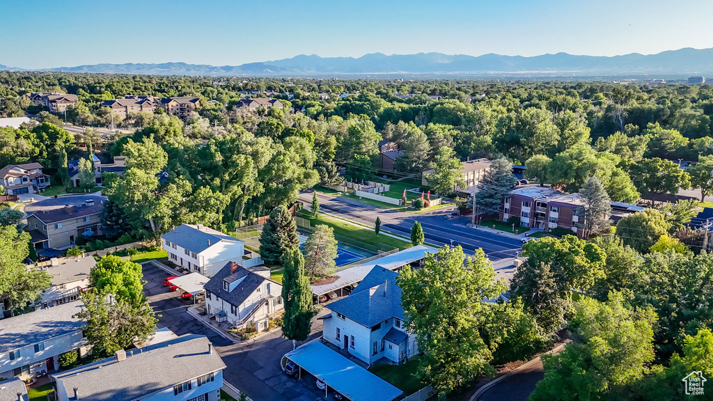 Aerial view of residential area with a mountain backdrop