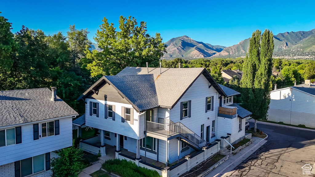 View from above of property featuring a mountainous background