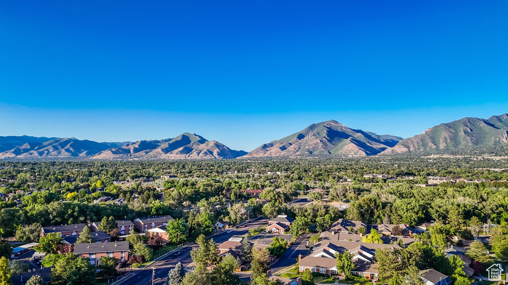 Mountain view featuring nearby suburban area
