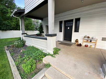 Entrance to property with a patio area