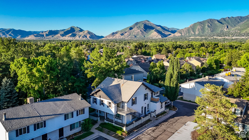 Aerial view of residential area featuring mountains