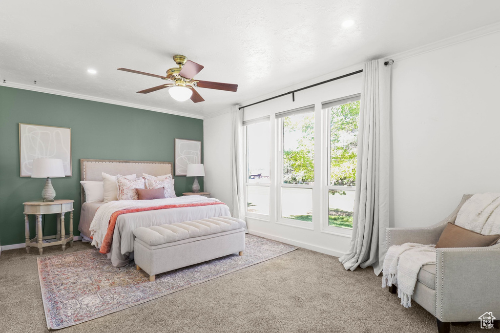 Bedroom featuring carpet floors, crown molding, a ceiling fan, and recessed lighting
