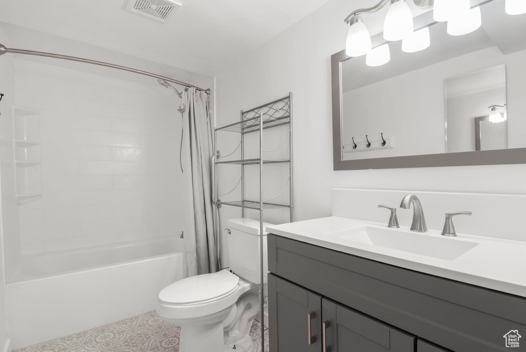 Full bath with shower / bathtub combination with curtain and vanity