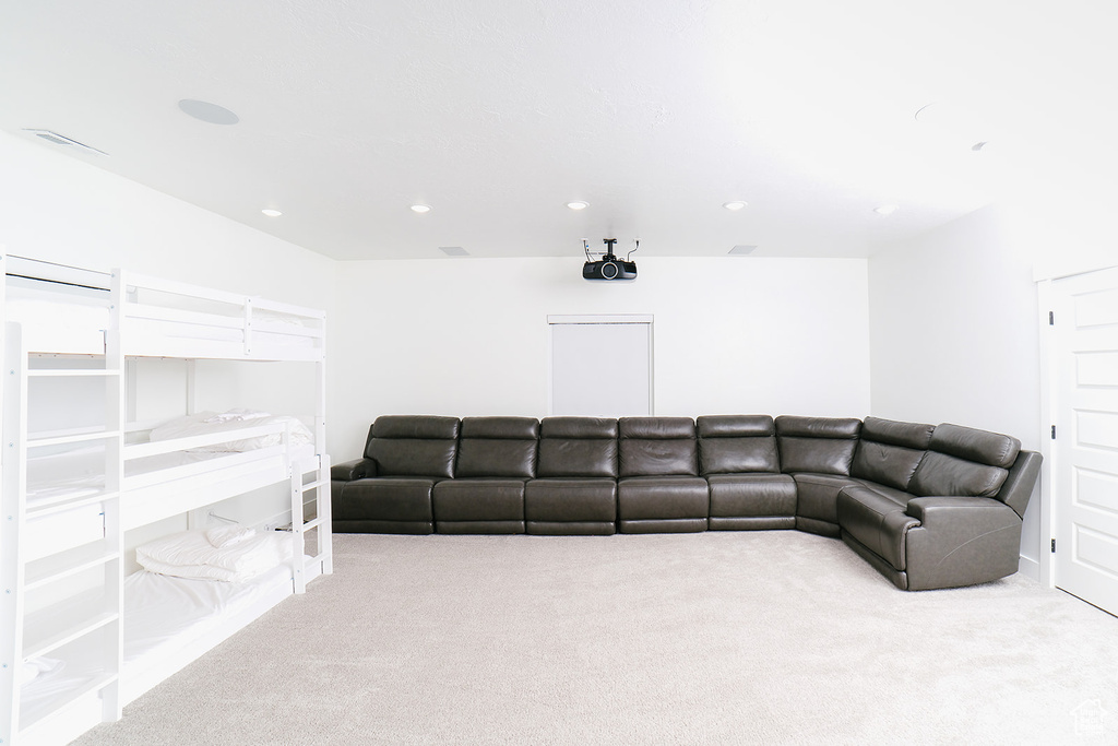 Carpeted cinema room featuring recessed lighting