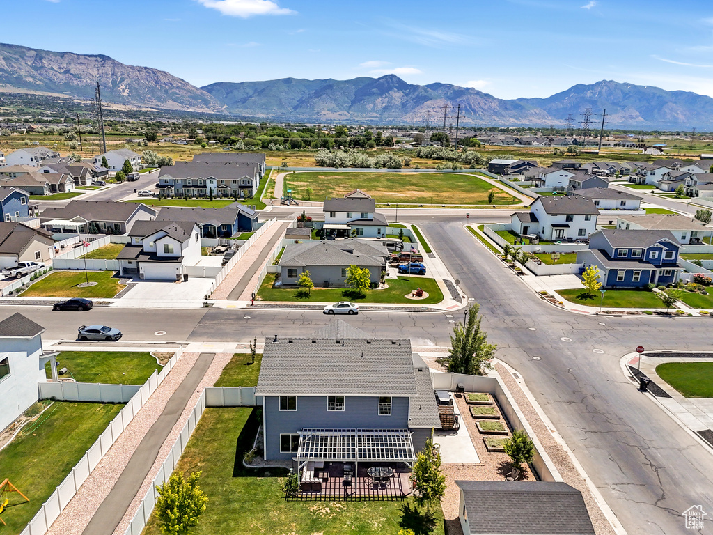 Aerial view of residential area with mountains