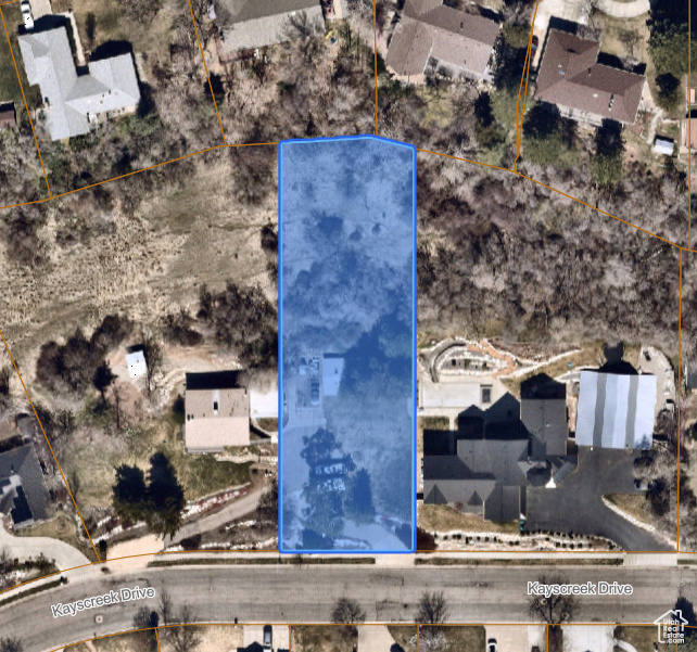 Aerial view of property\\\'s location featuring property parcel outlined