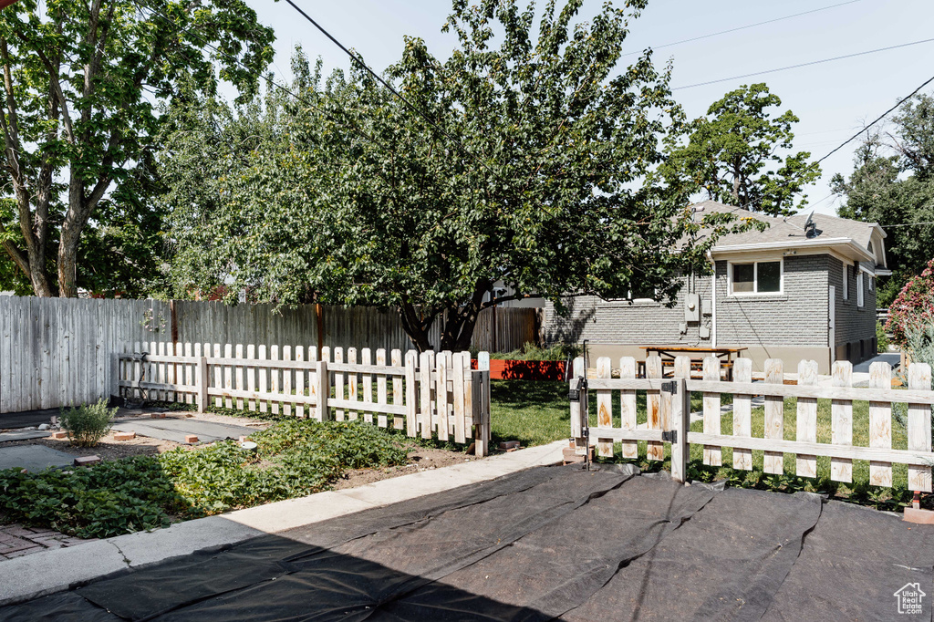 View of patio / terrace with a fenced front yard