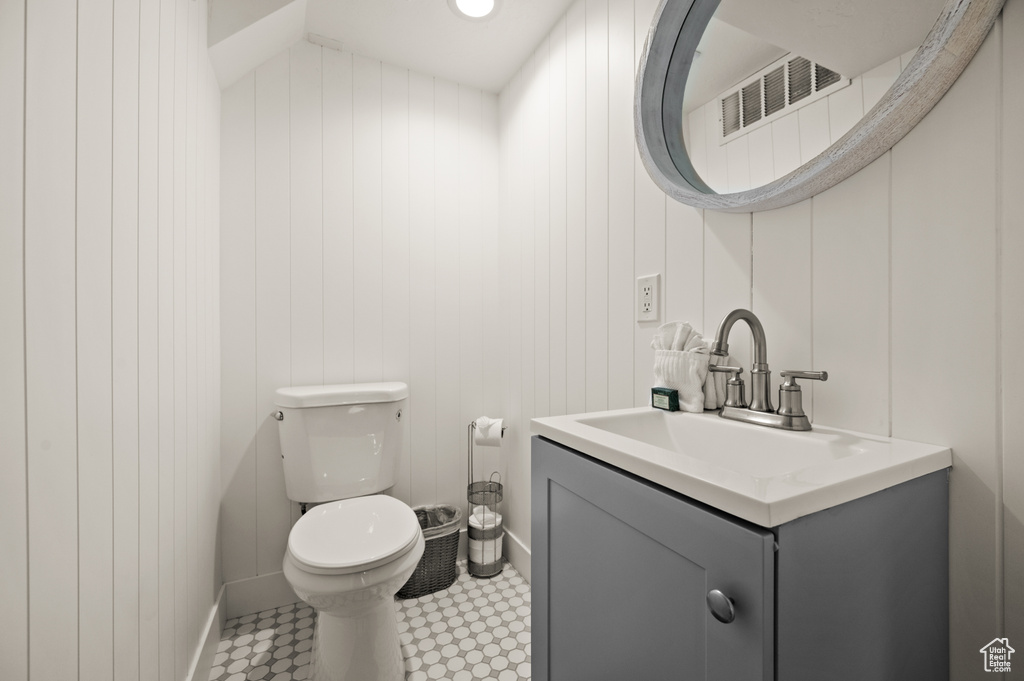 Bathroom with toilet and vanity