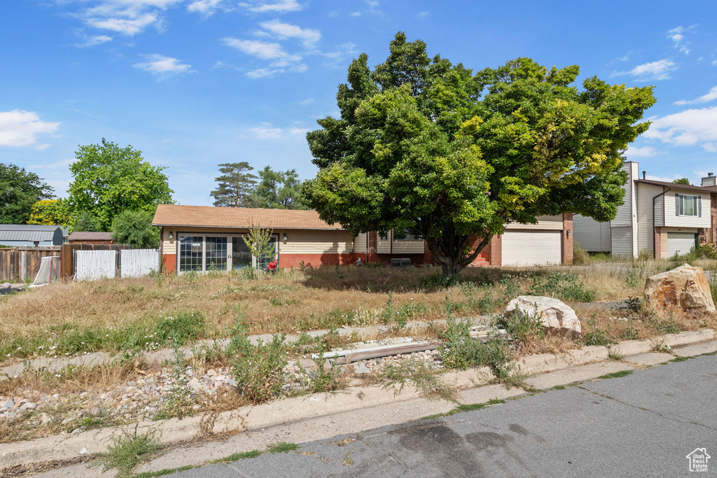 View of front facade with a garage