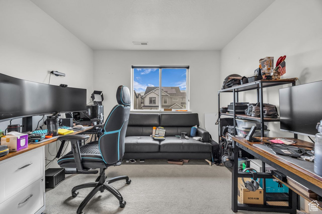 View of carpeted home office