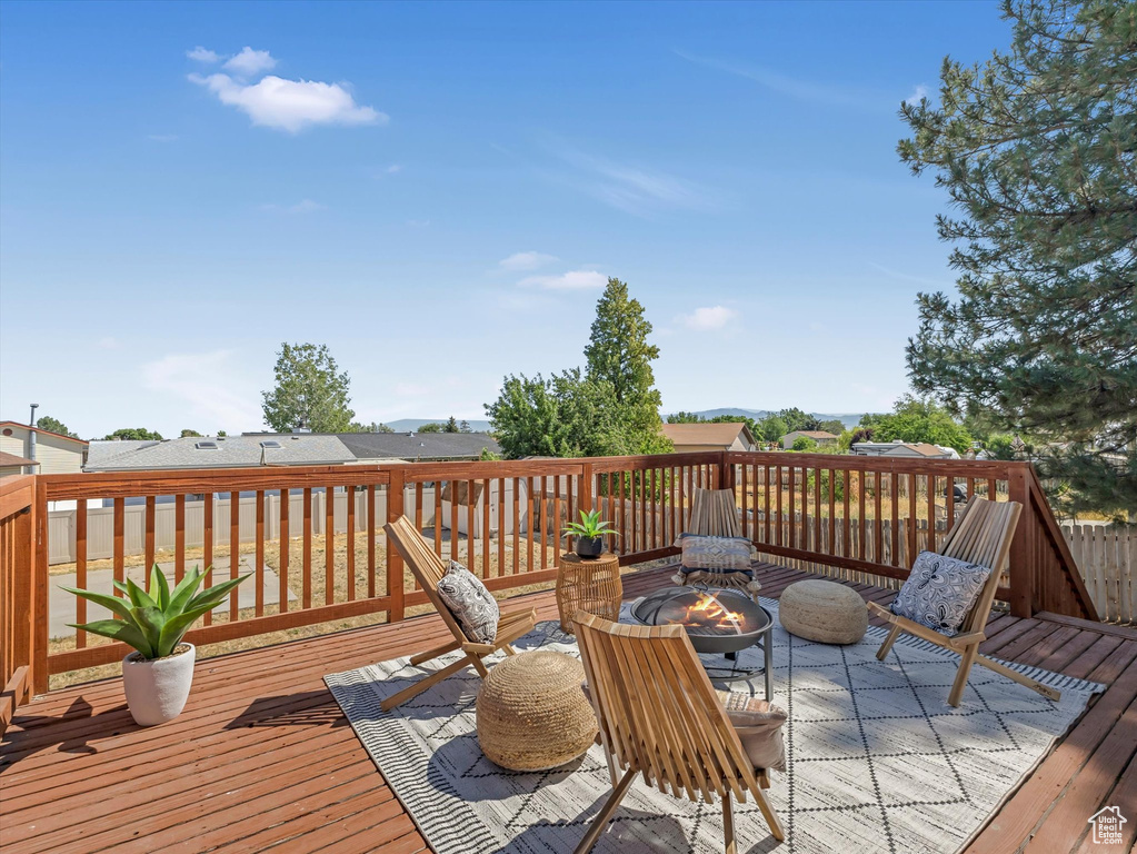 Deck with an outdoor fire pit