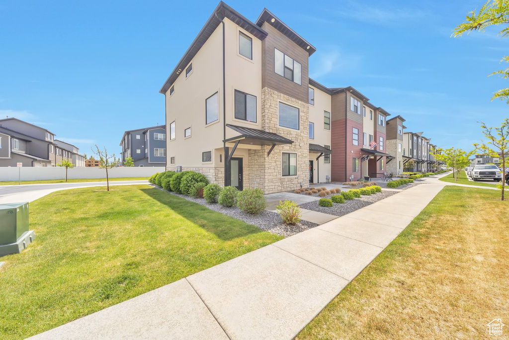 View of building exterior with a residential view