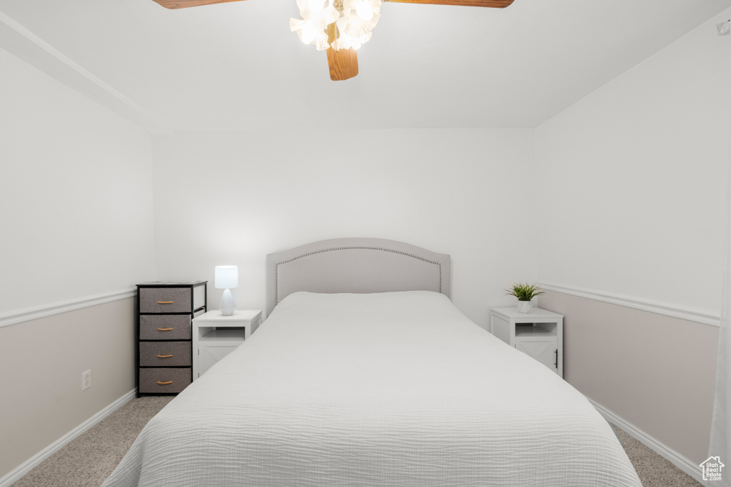 Bedroom featuring carpet floors and ceiling fan