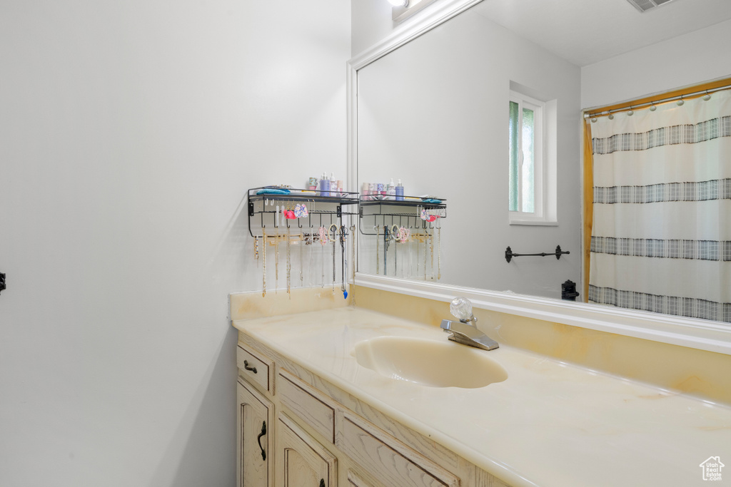 Bathroom featuring vanity