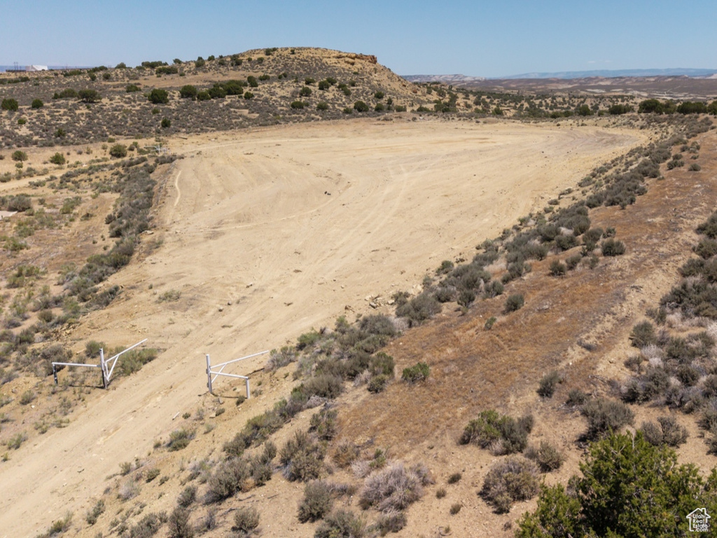 View of yard featuring a desert view and a rural view