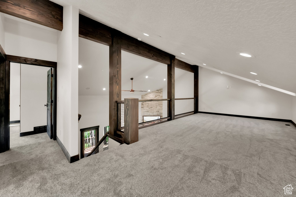 Unfurnished room with carpet, recessed lighting, and a textured ceiling